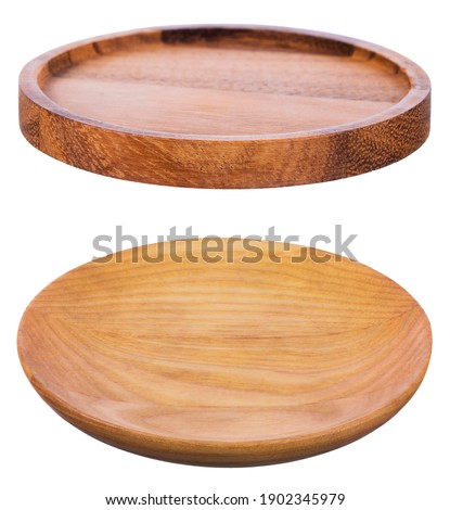 Wooden plate on white background Royalty-Free Stock Photo #1902345979