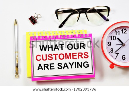 What our customers say. Text label on the planning folder. Research reviews for brand promotion, making a profit. Royalty-Free Stock Photo #1902393796