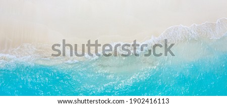Relaxing aerial beach scene, summer vacation holiday template banner. Waves surf with amazing blue ocean lagoon, sea shore, coastline. Perfect aerial drone top view. Peaceful bright beach, seaside Royalty-Free Stock Photo #1902416113
