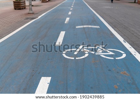 
The blue painted bike path