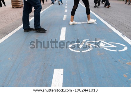 The blue painted bike path