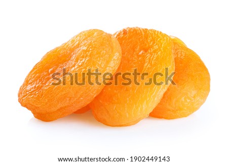 Dried apricots isolated on white background. With clipping path. Royalty-Free Stock Photo #1902449143