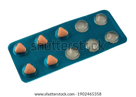 A blister with pills and empty spots.Fifty fifty used blister