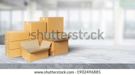 cardboard boxes in warehouse with copy space. transportation delivery concept