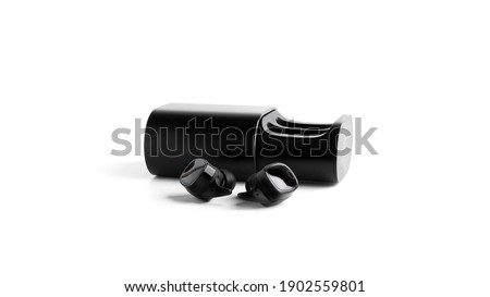 Black case with wireless headpones isolated on white background. High quality photo