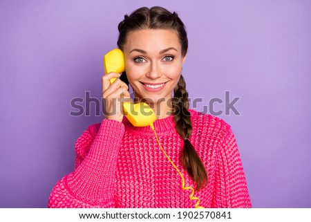 Photo of happy lovely attractive woman hold telephone good mood smile isolated on purple color background