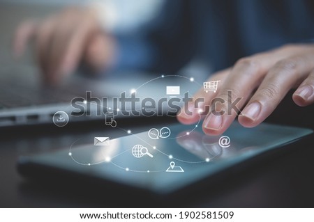 Digital marketing media, E-commerce, IoT Internet of Things, online shopping concept. Woman using mobile phone with icons,  and Pay Per Click (PPC) dashboard, business and technology Royalty-Free Stock Photo #1902581509