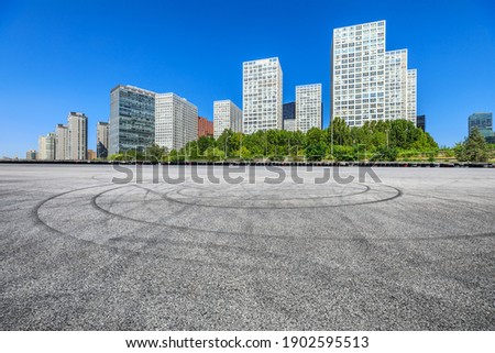 Race track road ground and modern city commercial buildings in Beijing,China.