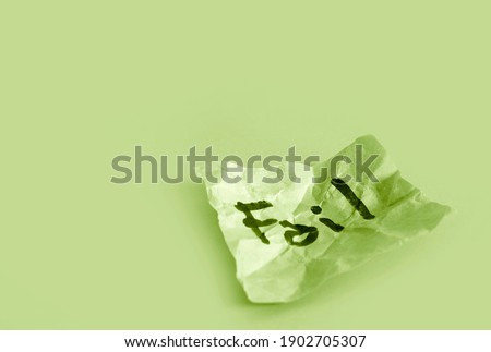 Fail word on crumpled paper , problem and fail concept