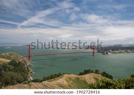Panoramic view over the famous Golden Gate Bridge and San Francisco on a sunny day from the Golden Gate Observation Deck