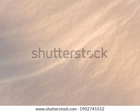 Shadows and patterns in the snow. Photo filter. Texture. Background