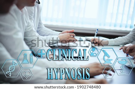 Medical healthcare concept - group of doctors in hospital with digital medical icons, graphic banner showing symbol of medicine, providing medical care. The inscription "CLINICAL HYPNOSIS" 