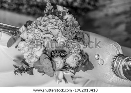 Delightful bridal bouquet close up in black and white.