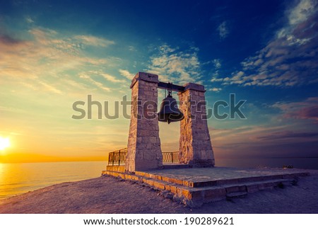 Chersonese bell at sunset near the sea.Vintage picture