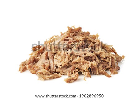 Heap of pulled pork on white background Royalty-Free Stock Photo #1902896950