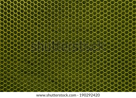yellow iron hexagonal texture. Industrial background 