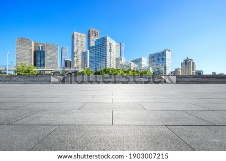 Empty floor and modern city commercial buildings in Beijing,China.