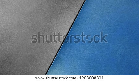 grey and blue leather background for loft interior style. half-half contrast of leather color and texutre use for advertising ,banner ,template.