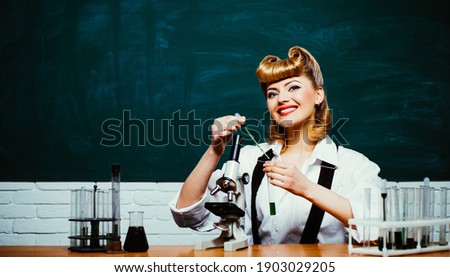 Chemistry lessons online. Young teacher scientist