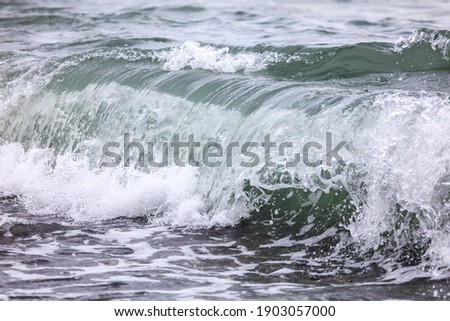 Wave in the sea with splashing water. Abstract background