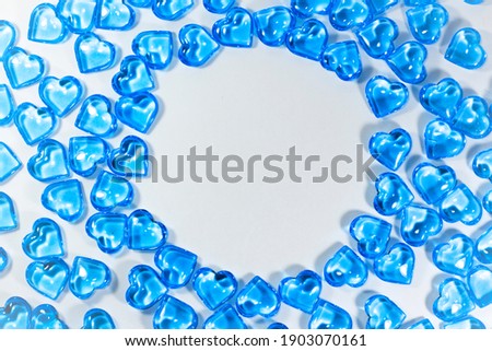 Blue Hearts Of glass On light Background For Happy Valentine's Day. Happy Mother's Day. Copy space