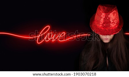woman with hat on black background