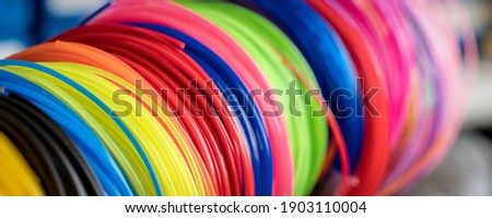 color plastic filament for printing on a 3D printer Royalty-Free Stock Photo #1903110004