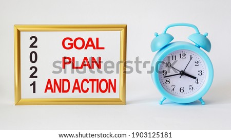On a gold frame, an inscription with the text Goals, plan and actions for 2021 on a white background Decision, strategy, decision, goal, business