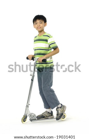 Boy on the scooter over the white background