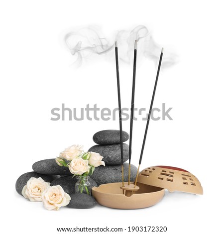Composition with smoldering incense sticks, roses and spa stones on white background Royalty-Free Stock Photo #1903172320