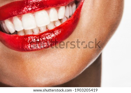 Close up shot of woman with red lipstick