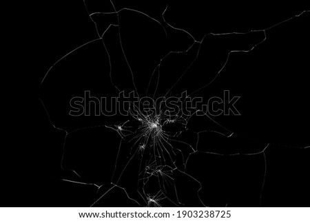 Broken glass on black background ,texture backdrop object design 