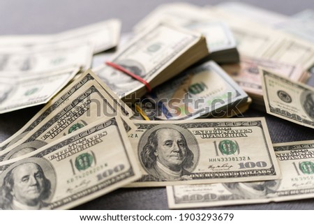 American dollar usa packs on money background. Financial concept Royalty-Free Stock Photo #1903293679