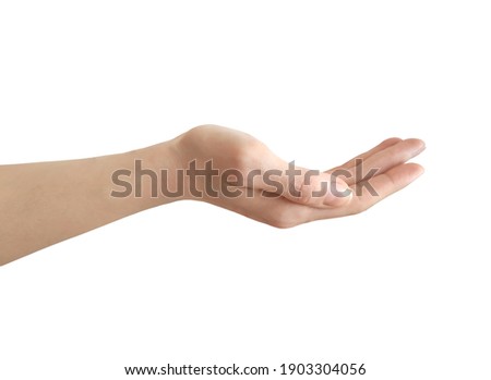 Open female hand palm up isolated on a white background Royalty-Free Stock Photo #1903304056
