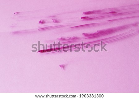 abstract pink background with pink paint stripes