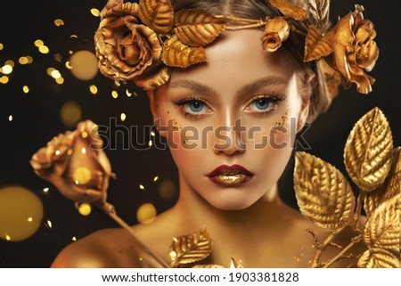 Fantasy portrait closeup woman with golden skin, lips, body. Girl in glamour wreath gold roses, accessories jewellery, jewelry. Beautiful face, steel glitter makeup. Elf fairy princess. Fashion model Royalty-Free Stock Photo #1903381828
