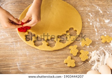 Baking background. Child doing cookies. Closeup Top view