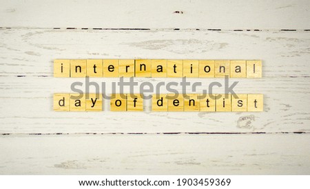 International Day of dentist.words from wooden cubes with letters