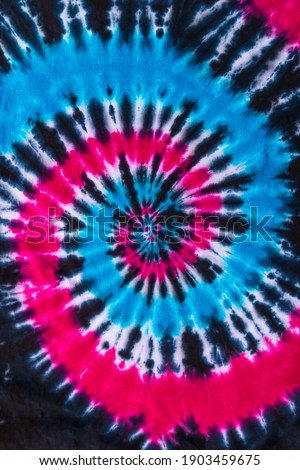 Fashionable Blue, Red, Black  Retro Abstract Psychedelic Tie Dye Swirl Design Royalty-Free Stock Photo #1903459675