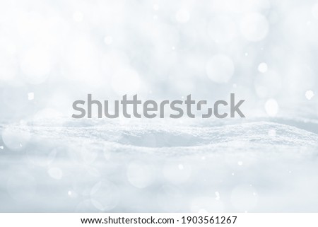 WHITE SNOW AND BOKEH LIGHTS BACKGROUND, COLD WINTER BACKGROUND AS CHRISTMAS BACKDROP FOR PRESENTS OR FRESH PRODUCTS