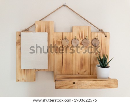 Empty white space on wood hanging key holder on white background. Blank writing area for advertisement content. 