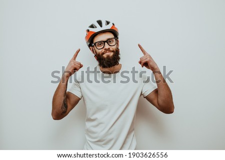 Portrait of handsome guy in the bike helmet