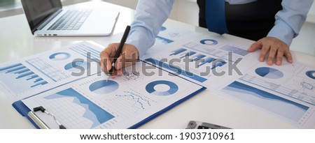 Business analyst checking in financial statement for audit internal control system. Accounting and Financial Concept. Royalty-Free Stock Photo #1903710961