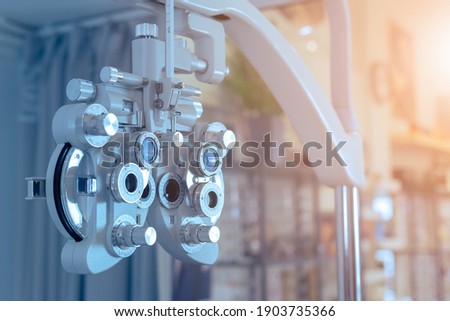 close up of phoropter eyesight measurement testing machine, Eye health check and ophthalmology concept. Royalty-Free Stock Photo #1903735366