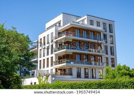 Modern multi-family apartment house in Berlin, Germany Royalty-Free Stock Photo #1903749454