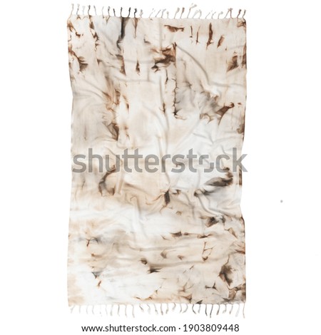 Tie dyed fabric of Turkish towel shibori pattern on fouta. Watercolor painted beach towel isolated on white background.
