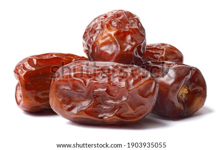 Pile of tasty dry dates isolated on white background. Arabic food Royalty-Free Stock Photo #1903935055