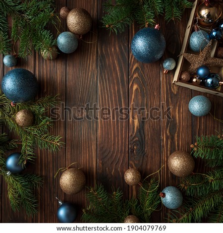 Christmas background with decorations on wooden background. Top view. Copy space.  Merry christmas and happy new year celebration concept. Mock-up