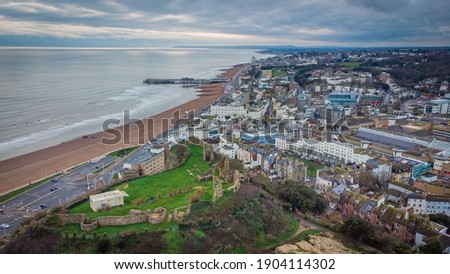 Hastings Castle with Hastings Pier in the background. East Sussex, England Royalty-Free Stock Photo #1904114302