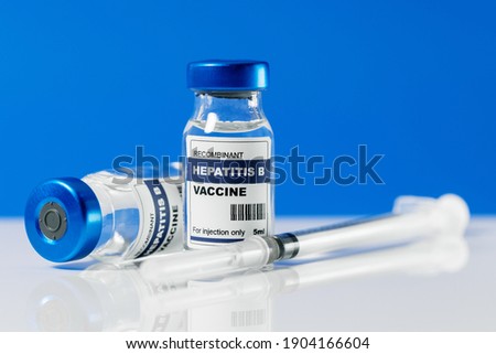 hepatitis b virus vaccine vials and syringe Royalty-Free Stock Photo #1904166604